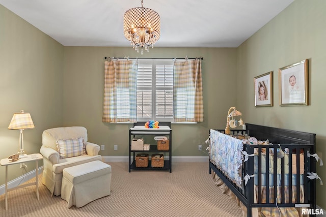 carpeted bedroom featuring a chandelier