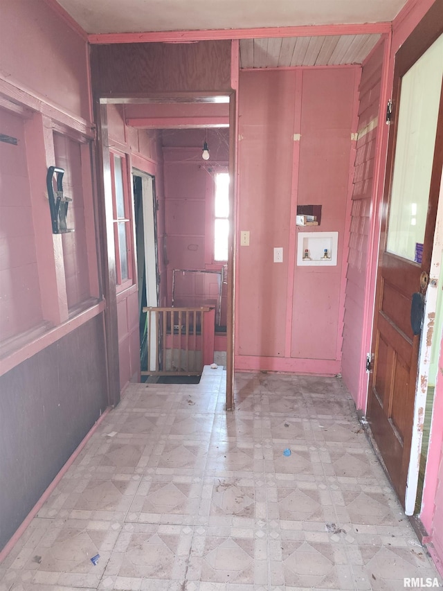 hallway with wooden walls