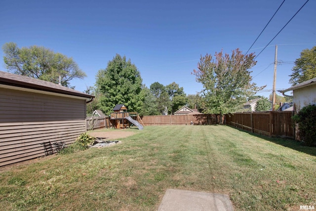 view of yard with a playground