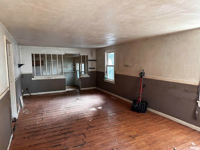 empty room featuring dark hardwood / wood-style floors