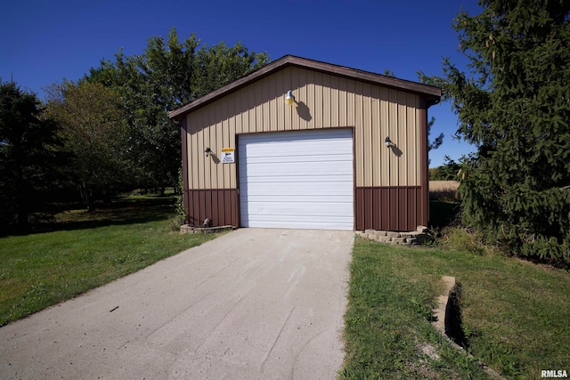 garage with a yard