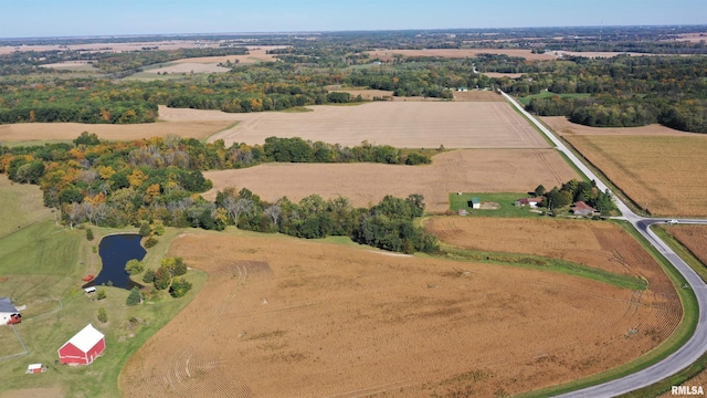 drone / aerial view featuring a rural view and a water view