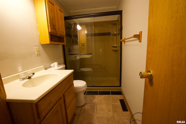 bathroom with walk in shower, tile patterned flooring, vanity, and toilet