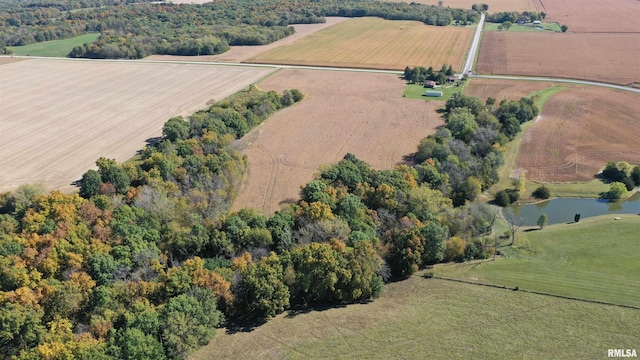 drone / aerial view featuring a water view and a rural view