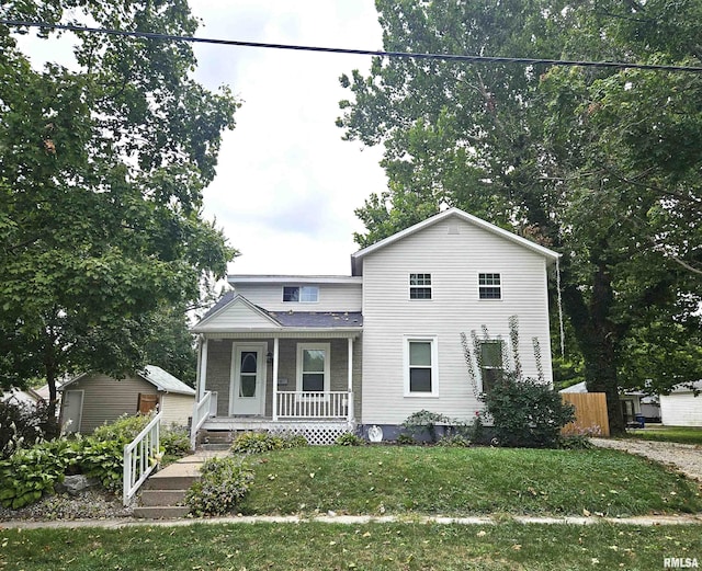 view of front of house featuring a porch and a front lawn