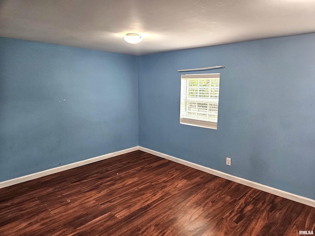 empty room featuring hardwood / wood-style flooring