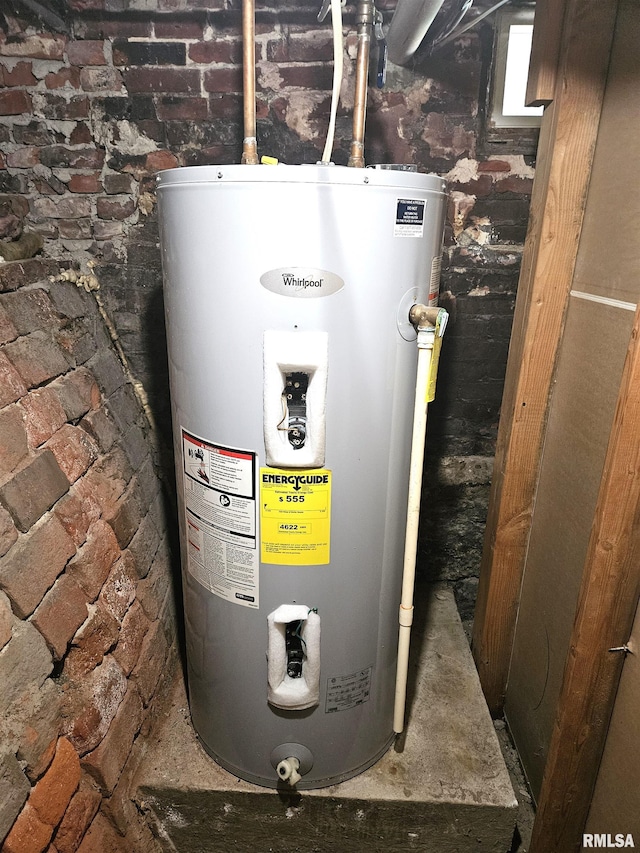 utility room with electric water heater