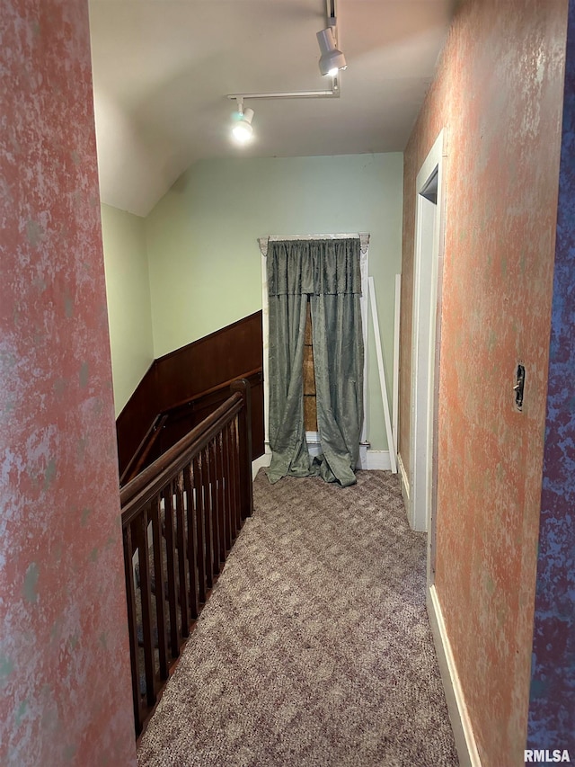 bedroom with ceiling fan, lofted ceiling, and carpet