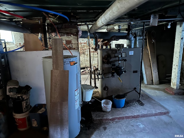 utility room featuring electric water heater