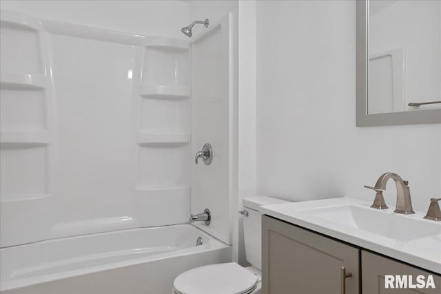 full bathroom featuring shower / washtub combination, vanity, and toilet