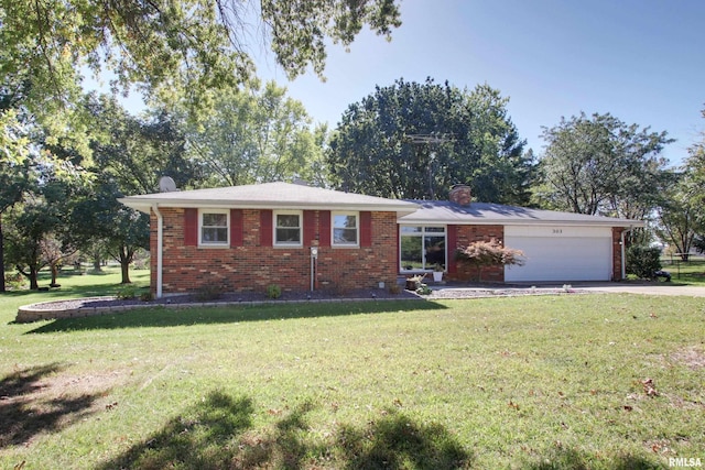 ranch-style house with a front lawn, a garage, brick siding, and concrete driveway