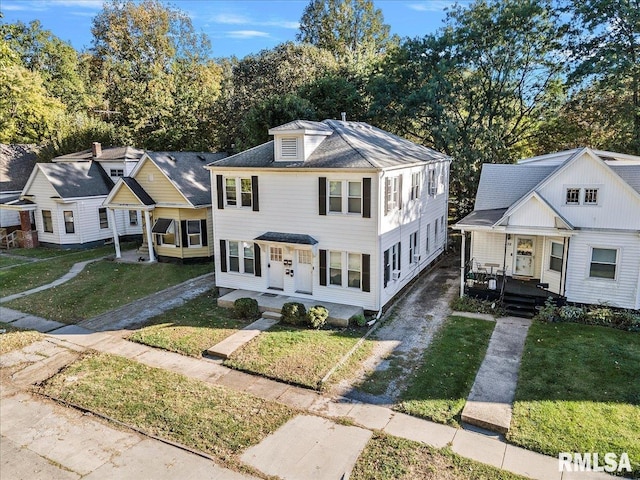 view of front of property with a front lawn