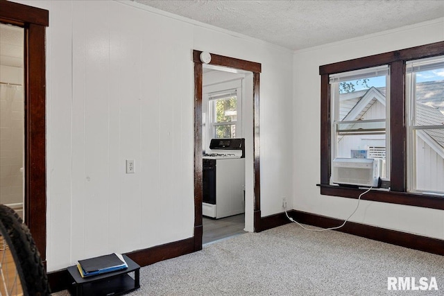 carpeted bedroom with multiple windows, wood walls, cooling unit, and a textured ceiling