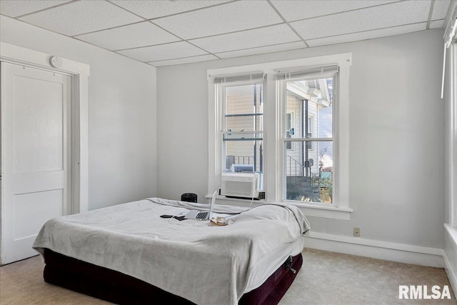 bedroom with a paneled ceiling, light carpet, pool table, and multiple windows