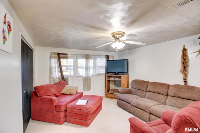 living room with ceiling fan