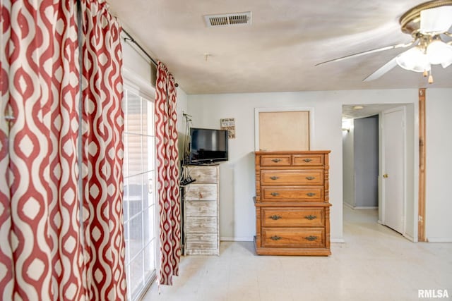 unfurnished bedroom featuring ceiling fan