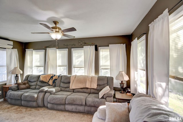 living room with ceiling fan, carpet, and a wall unit AC