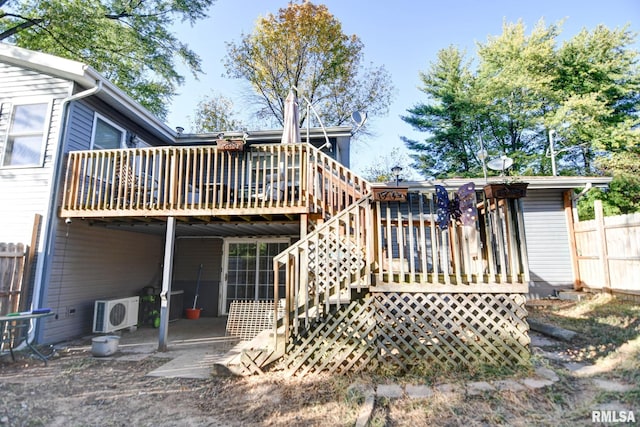 rear view of house featuring a deck