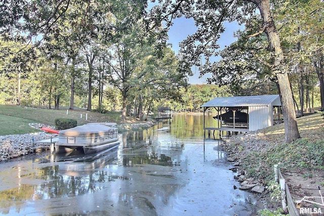 view of dock with a water view