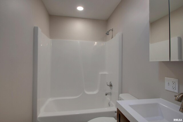 full bathroom featuring vanity, toilet, and shower / bathtub combination