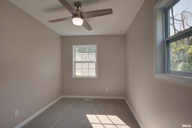 carpeted empty room with ceiling fan