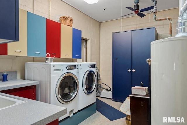 laundry area featuring cabinets, sink, washer and clothes dryer, and ceiling fan