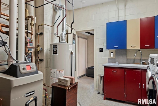 kitchen featuring water heater and sink