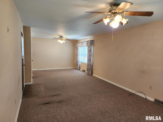 carpeted empty room featuring ceiling fan