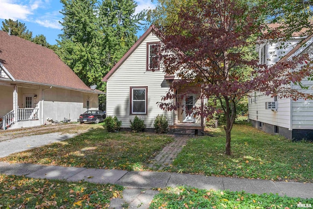 view of front of property with a front lawn