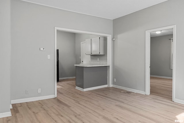 kitchen with light hardwood / wood-style floors