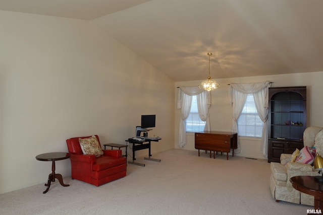 living area with carpet, a chandelier, and vaulted ceiling