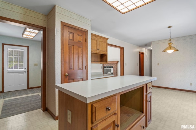 kitchen with a kitchen island and pendant lighting