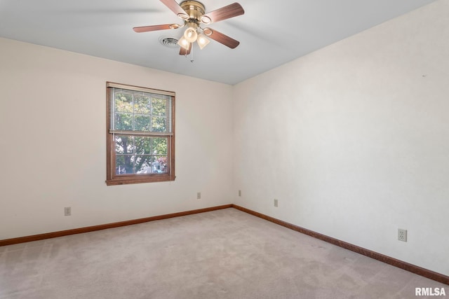 carpeted empty room with ceiling fan