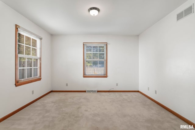 view of carpeted spare room