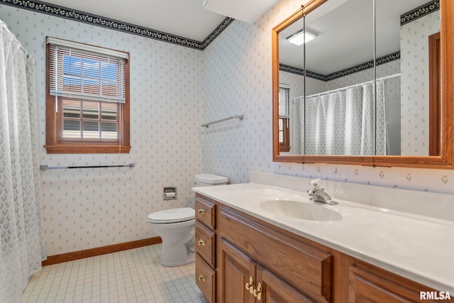 bathroom featuring vanity, curtained shower, toilet, and tile patterned flooring