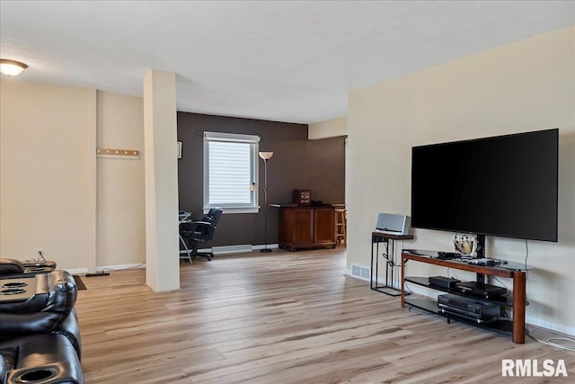 living room featuring light hardwood / wood-style flooring