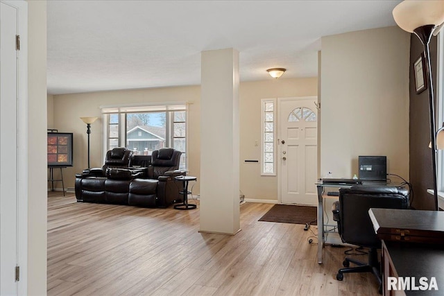 foyer with light hardwood / wood-style flooring