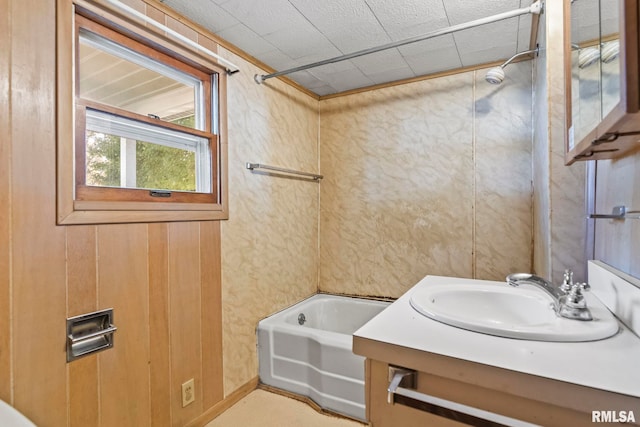 bathroom featuring vanity and bathing tub / shower combination