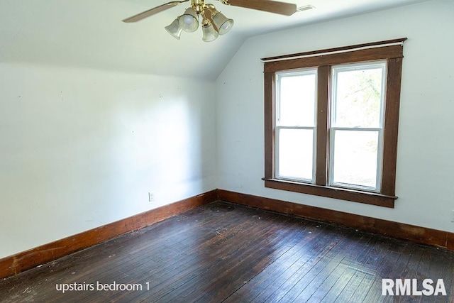 bonus room featuring ceiling fan, vaulted ceiling, and dark hardwood / wood-style flooring