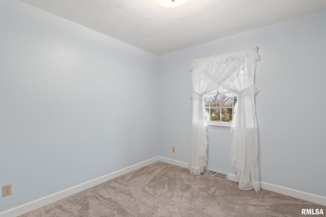 view of carpeted spare room