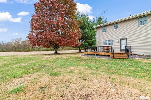 view of yard featuring a wooden deck