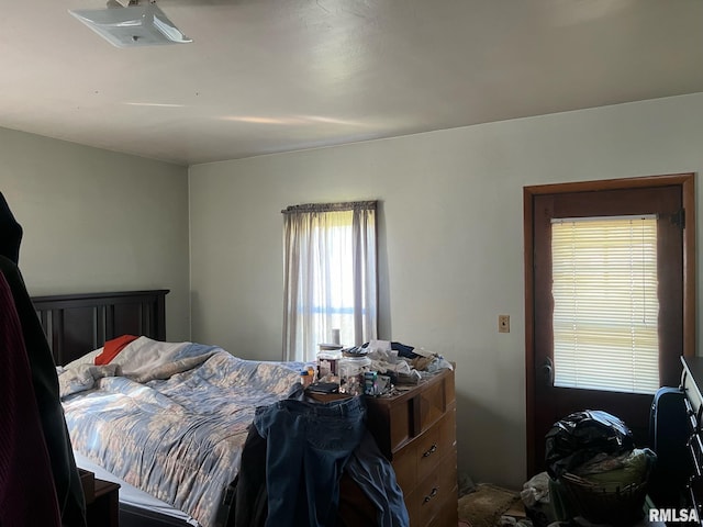 bedroom featuring multiple windows