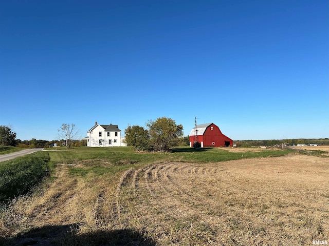 321 N County Road 1200, West Point, IL 62380 - view of green lawn featuring a barn, an outdoor structure, and a rural view