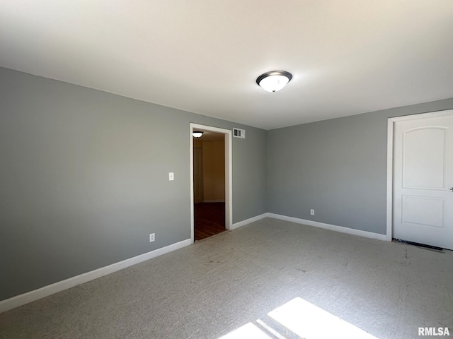 unfurnished bedroom featuring carpet