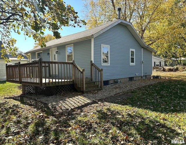 rear view of house with a deck