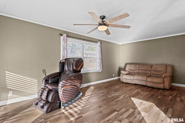 office space featuring dark wood-type flooring, ceiling fan, and ornamental molding