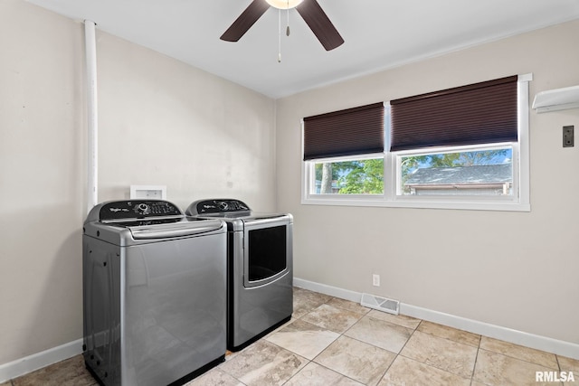 laundry room with independent washer and dryer, a healthy amount of sunlight, light tile patterned flooring, and ceiling fan