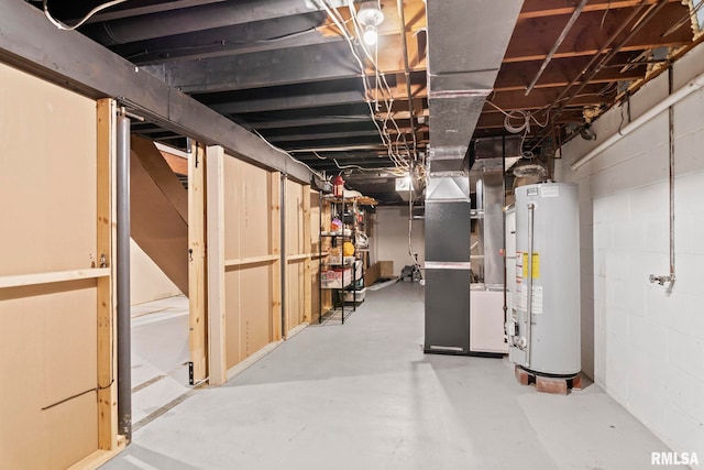 basement featuring heating unit and gas water heater