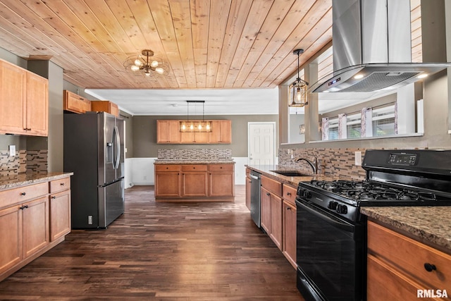 kitchen featuring sink, island exhaust hood, hanging light fixtures, and stainless steel appliances