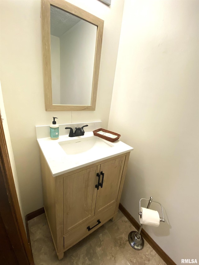 77 Country Pl Unit 77, Springfield, IL 62703 - bathroom with vanity and baseboards